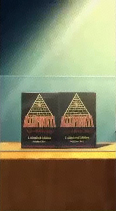 Two boxes of the Illuminati: New World Order card game, Unlimited Edition starter set, on a shelf
